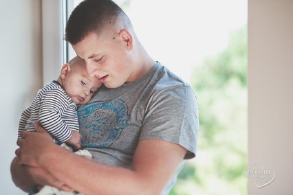 Ojciec z synem na chrzcie w Wołominie