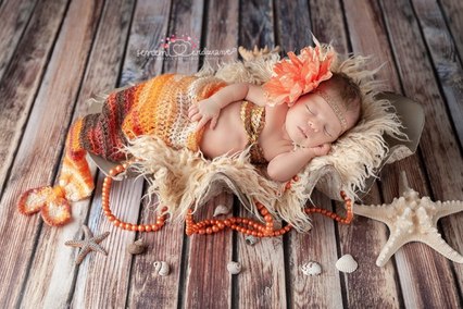 Sesja noworodkowa mała syrenka w muszli