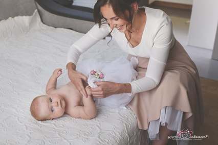 Fotograf chrzciny robi zdjęcie